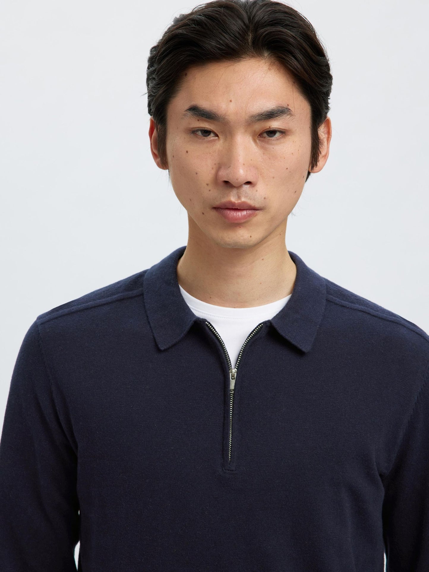 KNITTED LONG-SLEEVED POLO SELECTED
